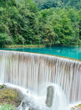 26801 ทัวร์จีน วัน 4 คืน อุทยานเสี่ยวฉี่โข่ง เมืองโบราณเจิ้นหยวน หมู่บ้านม้งพันครอบครัว บิ GX (BKK) 5 บิน GX Airlines
