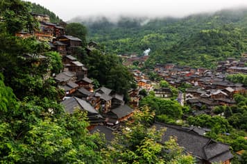 22763 ทัวร์จีน วัน 5 คืน 2UKWE-AQ001 ภูเขาหมื่นยอด ทะเลสาบหวั่นเฟิ่งหู หมู่บ้านหลงทูนเป่า หอเจี่ยซิ่วโหลว 6 บิน 9 Air