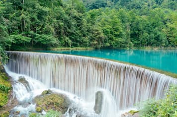 26801 ทัวร์จีน วัน 4 คืน อุทยานเสี่ยวฉี่โข่ง เมืองโบราณเจิ้นหยวน หมู่บ้านม้งพันครอบครัว บิ GX (BKK) 5 บิน GX Airlines