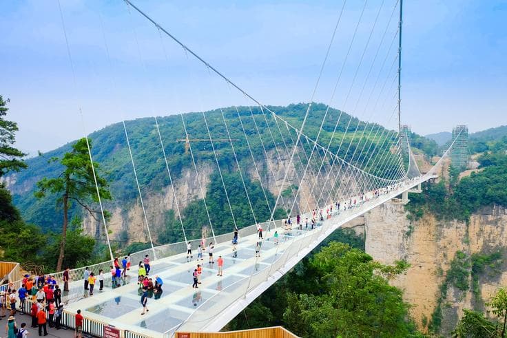 ทัวร์จีน จางเจียเจี้ย 5 วัน 4 คืน  ถ้ำประตูสวรรค์ สะพานแก้วจางเจียเจี้ยที่ยาวที่สุดในโลก กระเช้าขึ้นสู่เขาเทียนเหมินซาน บิน FD 