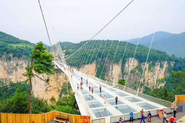 ทัวร์จีน จางเจียเจี้ย 5 วัน 3 คืน สวนเต๋าหัวหยวน สะพานแก้วจางเจียเจี้ย บิน VZ